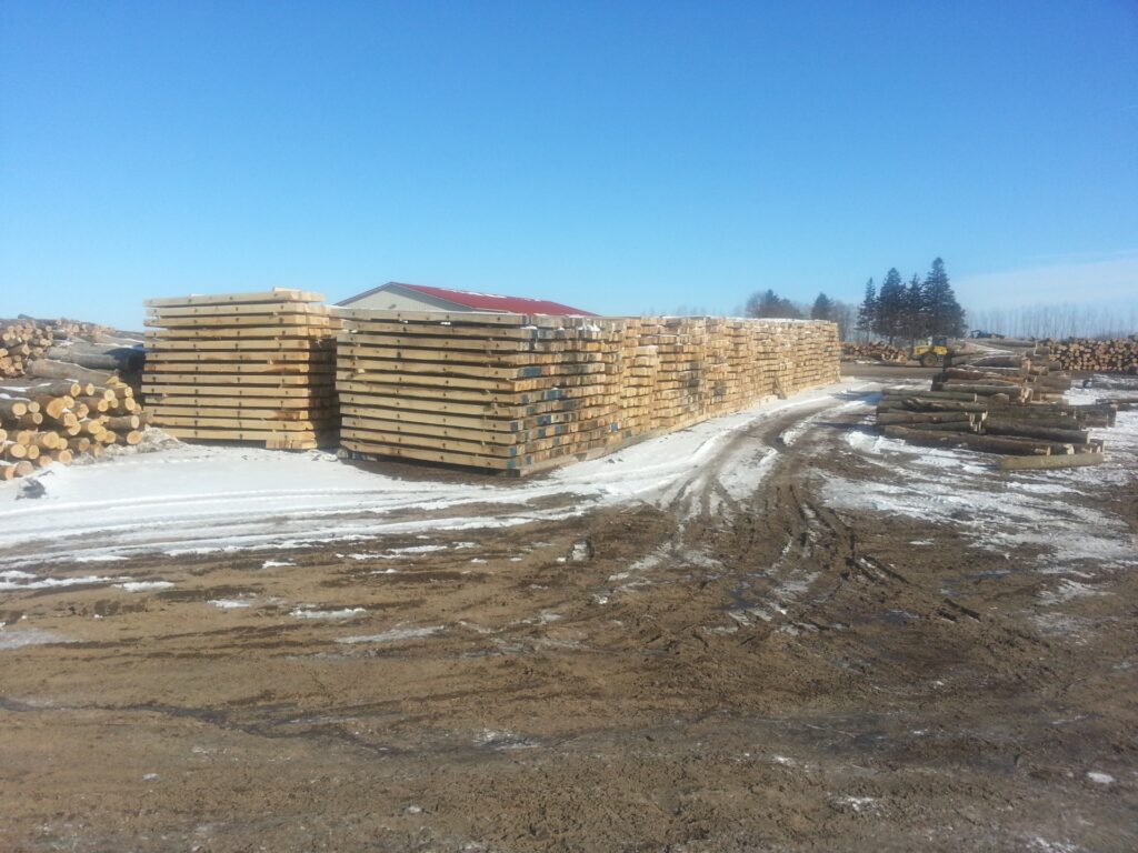 Stacks of crane mats in the Leer Wood Products yard
